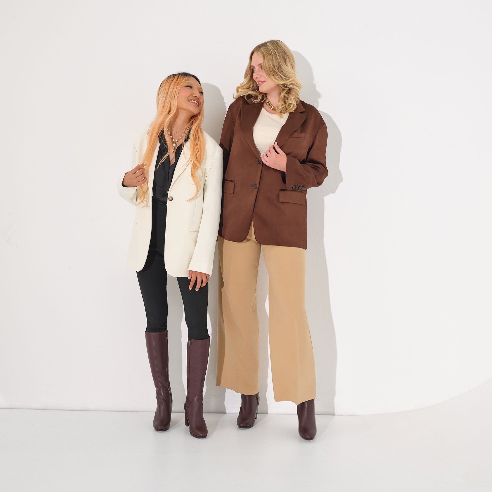 women wearing brown narrow calf fitting boots