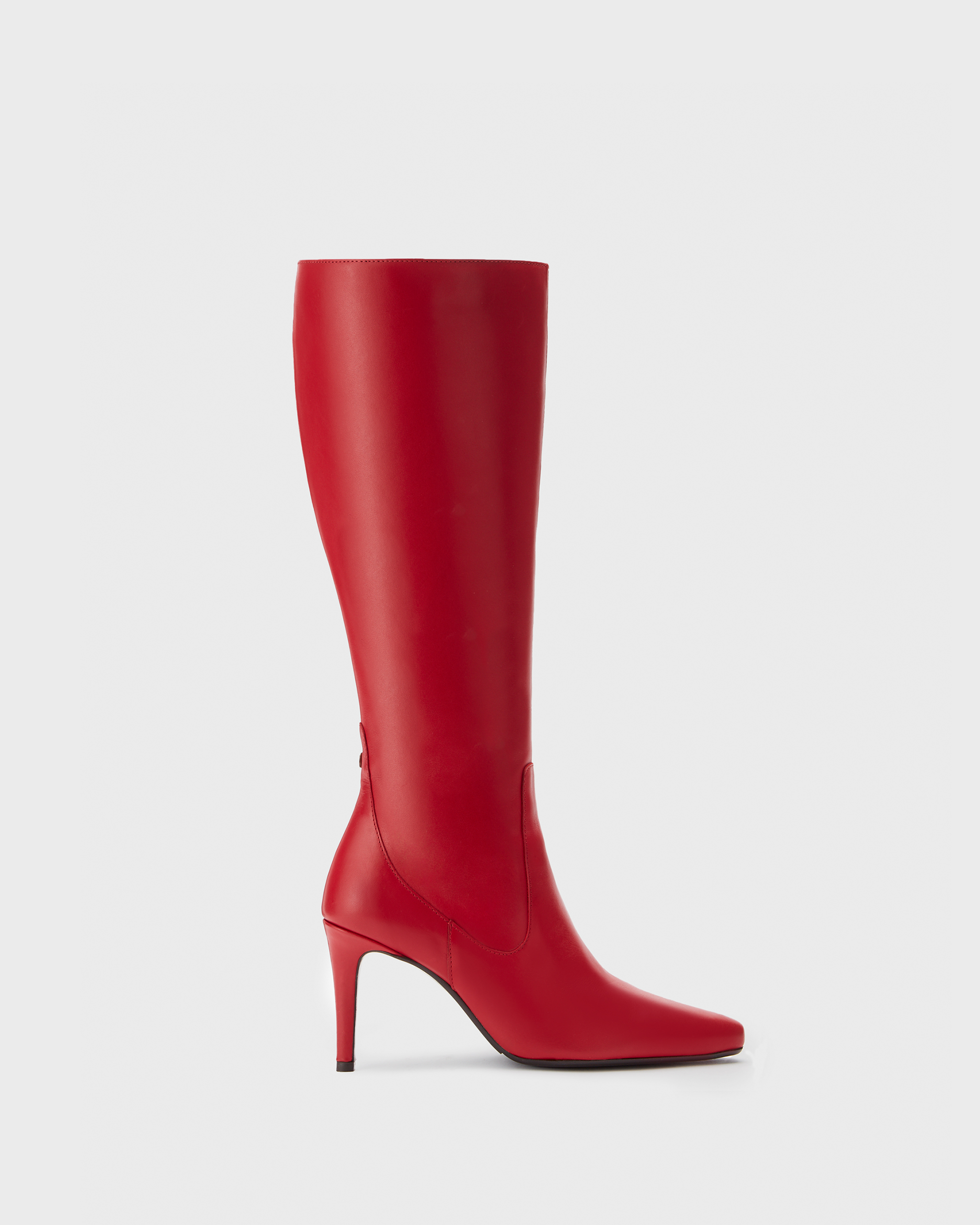 knee high red stiletto heeled boots