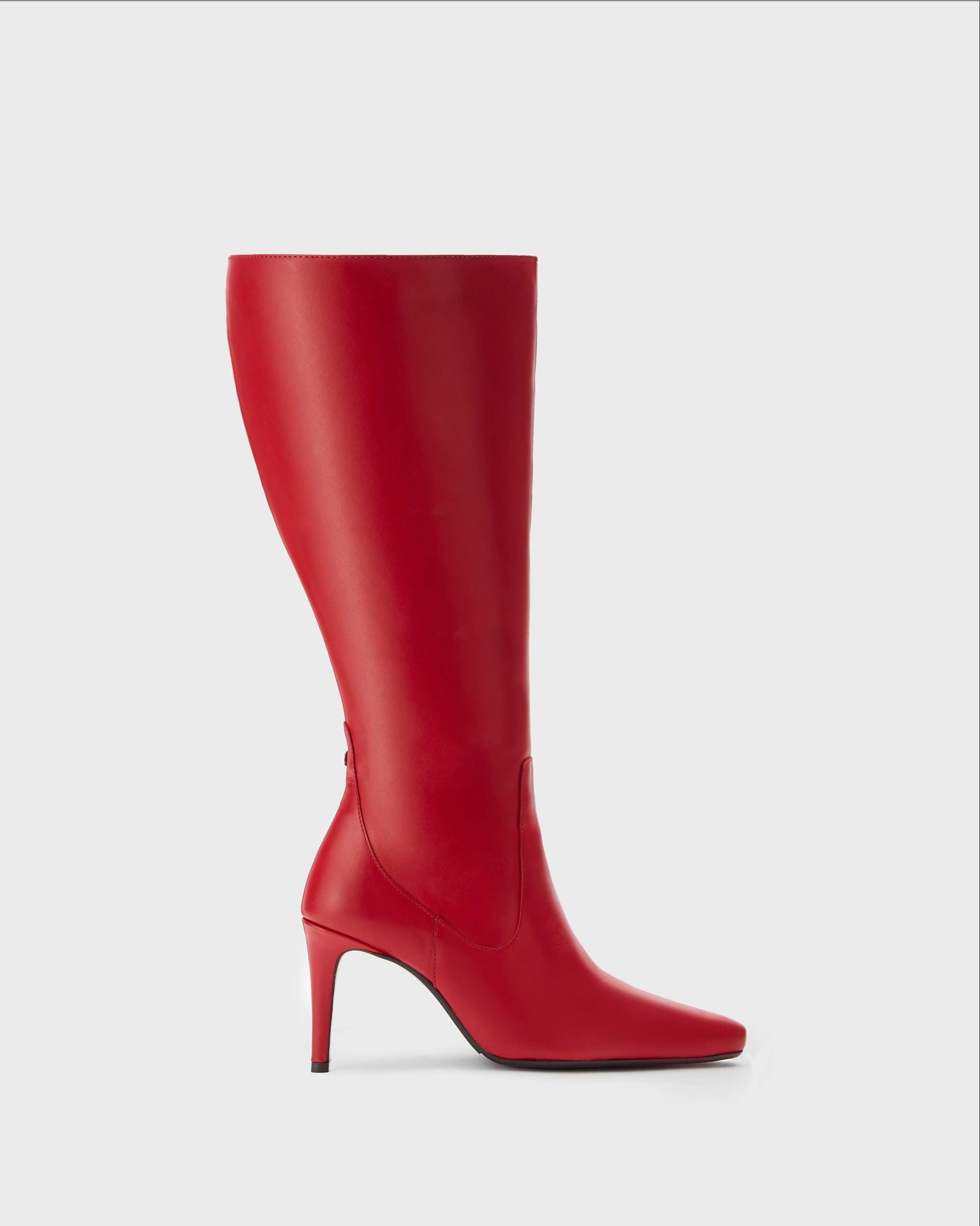 knee high red stiletto heeled boots