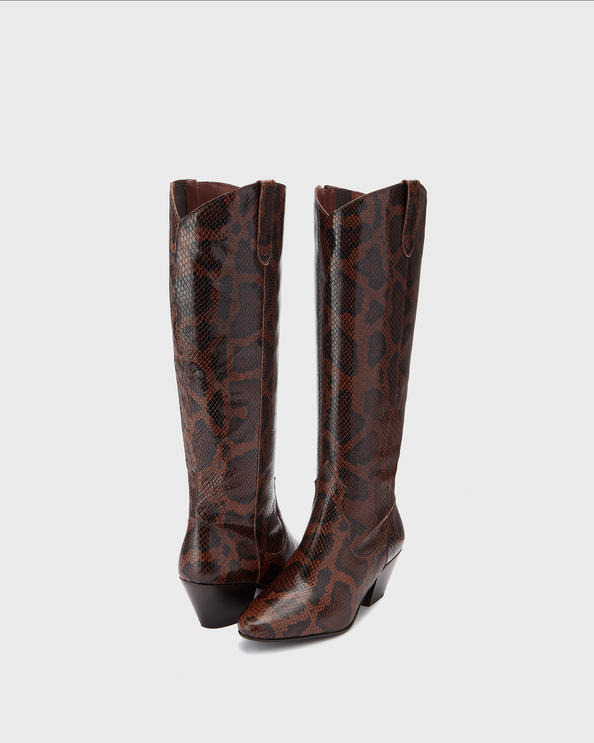 Knee high western style cowboy snake heeled boot